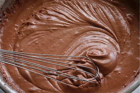 Mousse au chocolat in a mixing bowl with whisk Stock Photo - Premium Royalty-Free, Code: 659-03532153
