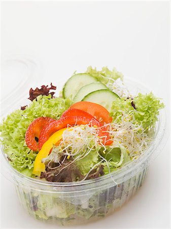 food in containers - Salad leaves with peppers, cucumber & sprouts in plastic container Stock Photo - Premium Royalty-Free, Code: 659-03532245