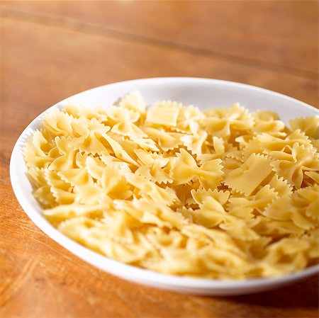 pasta bow - Farfalle in a deep plate Stock Photo - Premium Royalty-Free, Code: 659-03532955