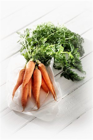 A bunch of fresh carrots Stock Photo - Premium Royalty-Free, Code: 659-03533647