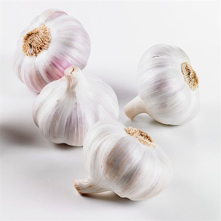 Four garlic bulbs Stock Photo - Premium Royalty-Free, Code: 659-03533983