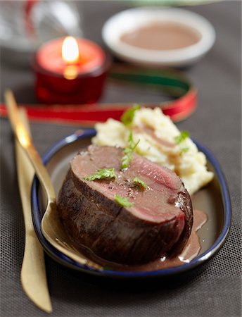 simsearch:652-05807406,k - Roast bison with Grand veneur sauce,mixed mashed potatoes and celeriac Stock Photo - Premium Royalty-Free, Code: 652-05808478