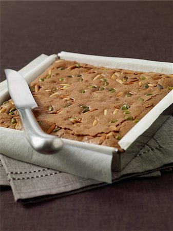 pistachio - Chocolate,pine nut and pistachio brownie Stock Photo - Premium Royalty-Free, Code: 652-05808720