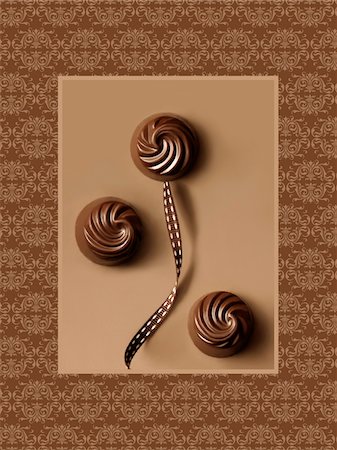 Three chocolates Stock Photo - Premium Royalty-Free, Code: 652-05808884