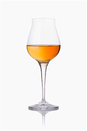 simsearch:652-03802277,k - Stemmed glass of Cognac Stock Photo - Premium Royalty-Free, Code: 652-06818719