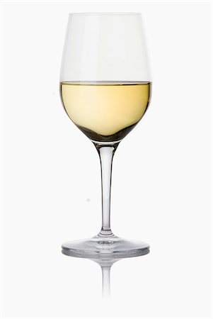 simsearch:652-03802277,k - Stemmed glass of white wine Stock Photo - Premium Royalty-Free, Code: 652-06818720