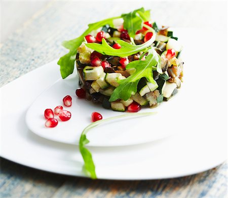 Zucchini,eggplant and pomegranate seed Timbale Stock Photo - Premium Royalty-Free, Code: 652-06818786