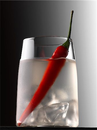simsearch:652-03802277,k - Vodka and red hot pepper cocktail Stock Photo - Premium Royalty-Free, Code: 652-06818900