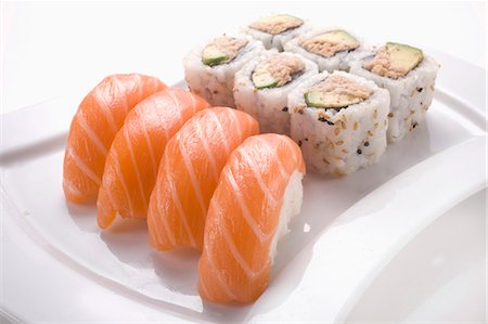 Salmon Sushis and Californian Makis Stock Photo - Premium Royalty-Free, Code: 652-06819277