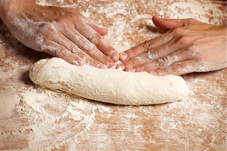 Shaping the dough Stock Photo - Premium Royalty-Free, Code: 652-07655758