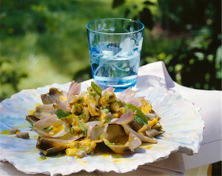 Artichokes with whelks and confit citrus Stock Photo - Premium Royalty-Free, Code: 652-03634758