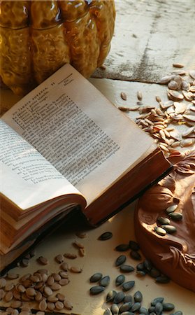 Melon seeds and book Stock Photo - Premium Royalty-Free, Code: 652-03633510