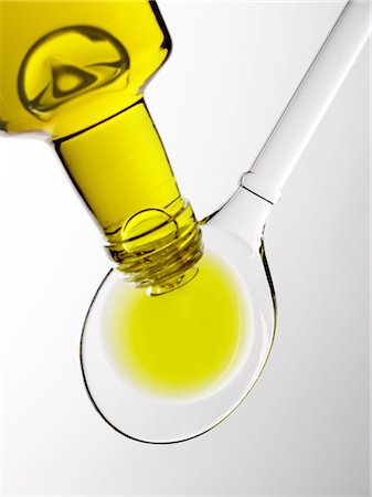 spoonful - Spoonful of oil Stock Photo - Premium Royalty-Free, Code: 652-03633672