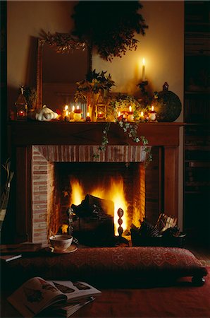 Christmas decorations on the fireplace in the living room Stock Photo - Premium Royalty-Free, Code: 652-03799941