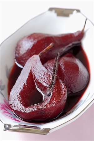 Pears poached in red wine Stock Photo - Premium Royalty-Free, Code: 652-03800931