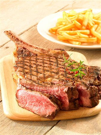 simsearch:825-05985428,k - Grilled beef chop and chips Stock Photo - Premium Royalty-Free, Code: 652-03802274