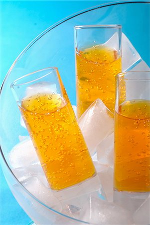 Fizzy orange soda Stock Photo - Premium Royalty-Free, Code: 652-03802867