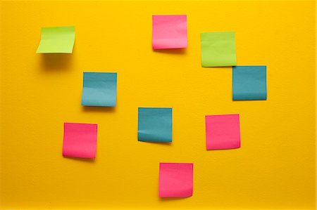 Yellow wall with colorful post-its Stock Photo - Premium Royalty-Free, Code: 673-06025436