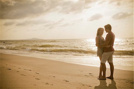 sepia toned - Romantic young couple on beach Stock Photo - Premium Royalty-Free, Code: 673-06964770