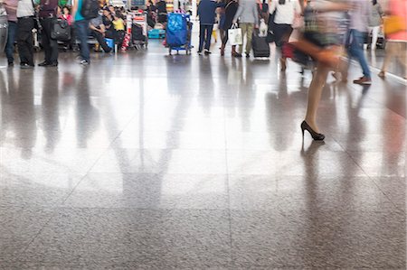 roll on luggage - Travelers in the Chongqing airport, Chongqing, China Stock Photo - Premium Royalty-Free, Code: 673-08139267