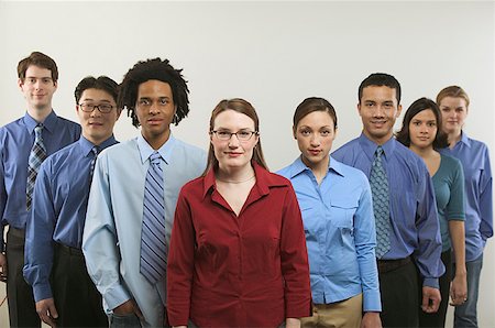 Portrait of eight young business people. Stock Photo - Premium Royalty-Free, Code: 673-02137712