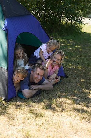 simsearch:673-02138237,k - Family looking out of tent at campsite. Stock Photo - Premium Royalty-Free, Code: 673-02137808