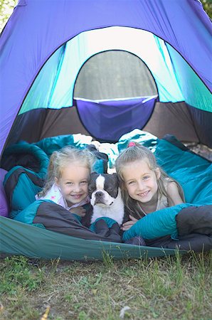 simsearch:673-02138072,k - Sisters and dog in a tent. Stock Photo - Premium Royalty-Free, Code: 673-02137802