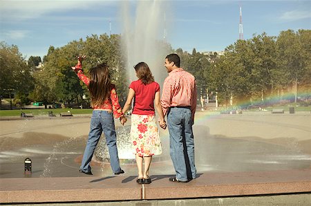 simsearch:673-02138237,k - Rear view of a family watching a fountain. Stock Photo - Premium Royalty-Free, Code: 673-02138047