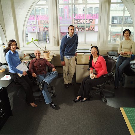 Five young business colleagues in their office. Stock Photo - Premium Royalty-Free, Code: 673-02138379