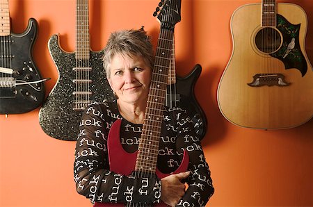 rocker - Portrait of a woman and her guitars. Stock Photo - Premium Royalty-Free, Code: 673-02138577