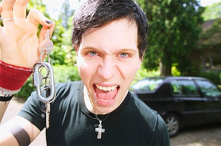 A punky male and his car keys Stock Photo - Premium Royalty-Free, Code: 673-02138686