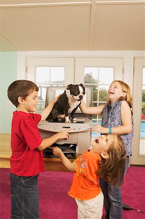 silly dog - Three kids photo copying a dog Stock Photo - Premium Royalty-Free, Code: 673-02138735