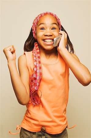 A girl talking on a mobile phone Stock Photo - Premium Royalty-Free, Code: 673-02138731