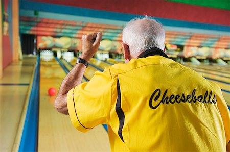 elder workout - A senior man bowling Stock Photo - Premium Royalty-Free, Code: 673-02139193