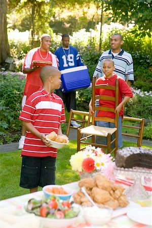 simsearch:673-02139604,k - Males preparing for a summer picnic Stock Photo - Premium Royalty-Free, Code: 673-02139588