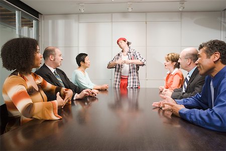 female group cartoons - Weird co-worker at a meeting Stock Photo - Premium Royalty-Free, Code: 673-02139641