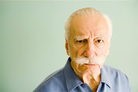 Portrait of annoyed senior man Stock Photo - Premium Royalty-Free, Code: 673-02139854