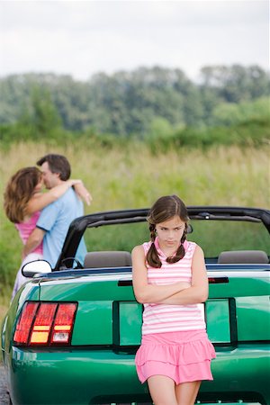 simsearch:614-06896477,k - Unhappy daughter of affectionate parents Stock Photo - Premium Royalty-Free, Code: 673-02140171