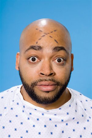 Male patient with X on forehead Stock Photo - Premium Royalty-Free, Code: 673-02140995