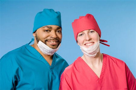 Close up portrait of two doctors wearing scrubs Stock Photo - Premium Royalty-Free, Code: 673-02141023