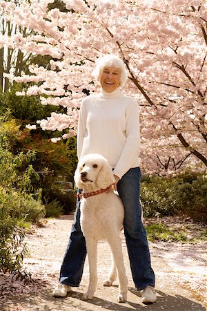 Portrait of senior woman with dog Stock Photo - Premium Royalty-Free, Code: 673-02141057