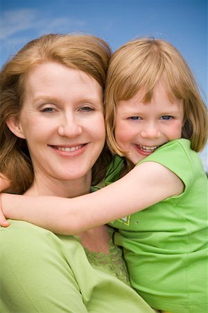 simsearch:673-02143625,k - Close up portrait of woman holding daughter Stock Photo - Premium Royalty-Free, Code: 673-02141389