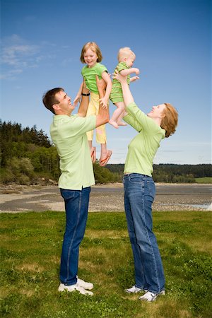 simsearch:673-02143625,k - Family playing together on beach Stock Photo - Premium Royalty-Free, Code: 673-02141395
