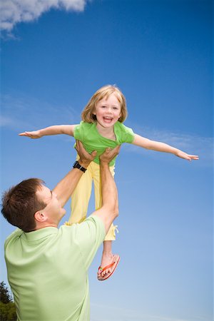 simsearch:673-02143625,k - Portrait of girl playing with father Stock Photo - Premium Royalty-Free, Code: 673-02141392