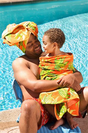 simsearch:673-02143625,k - Father and son drying off by pool Stock Photo - Premium Royalty-Free, Code: 673-02141565