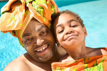 simsearch:673-02143625,k - Father and son drying off by pool Stock Photo - Premium Royalty-Free, Code: 673-02141568