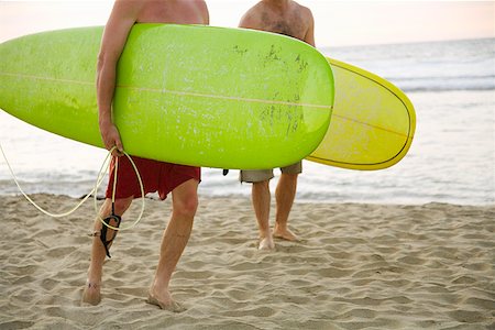 pictures of people walking with surfboards in the water - Two men carrying surfboards Stock Photo - Premium Royalty-Free, Code: 673-02143238