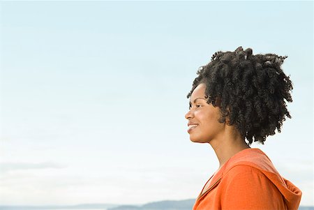 dreadlocks on african americans - Profile of African woman with dreadlocks Stock Photo - Premium Royalty-Free, Code: 673-02143374
