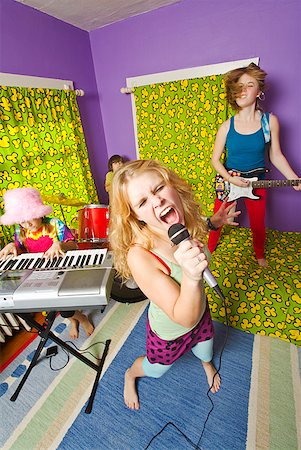 simsearch:649-06716505,k - Kids playing instruments in band Stock Photo - Premium Royalty-Free, Code: 673-02143555