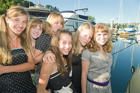 Group of teenaged girls at marina Stock Photo - Premium Royalty-Free, Code: 673-02143599